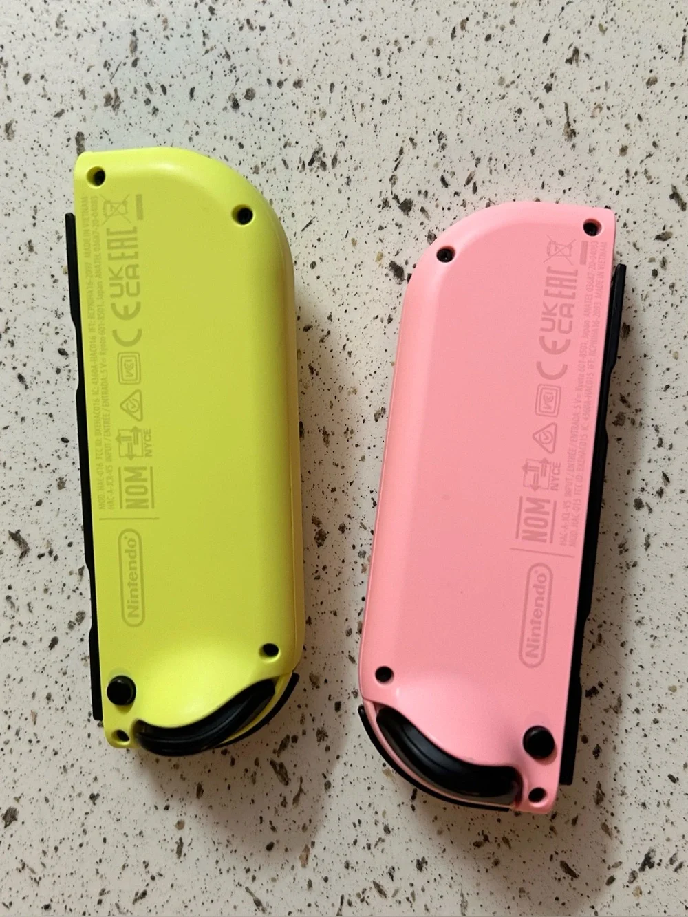 Nintendo Switch with Pastel Pink and Yellow Joycons + Accessories (Preowned)